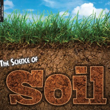 A book cover features a cross-section of soil with green grass growing on top against a blue sky with clouds.