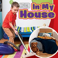 A book cover shows a young boy vacuuming a colorful rug in a room with a blue bench, and a circular inset of a neatly made bed with a teddy bear.
