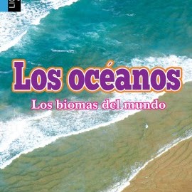 A book cover displays an aerial view of ocean waves breaking on a sandy beach, with the Spanish title "Los océanos" in large purple and orange letters and "Los biomas del mundo" in smaller pink text below it.