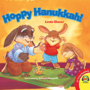 A book cover showing 3 cartoon bunnies playing with a dreidel.