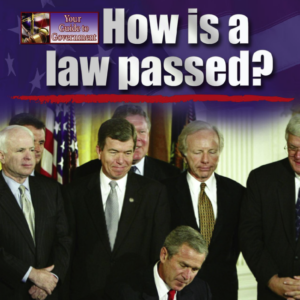 A book cover showing President George W. Bush signing a law