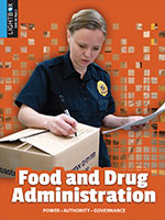 Book cover showing a person next to a box doing paperwork