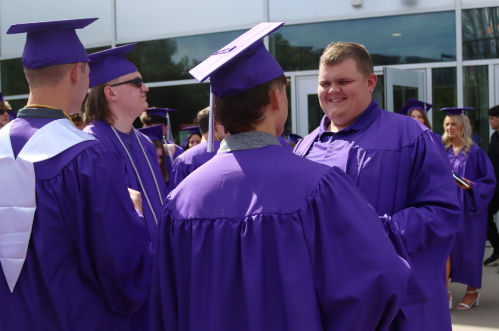 Northwest students outside after their graduation ceremony