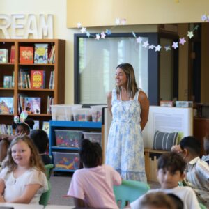 Mrs. Owens gives directions in the library.