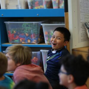 A student laughs during a read aloud.
