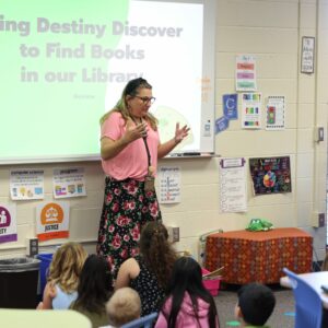 Students listen to Mrs. Townsley giving instructions.