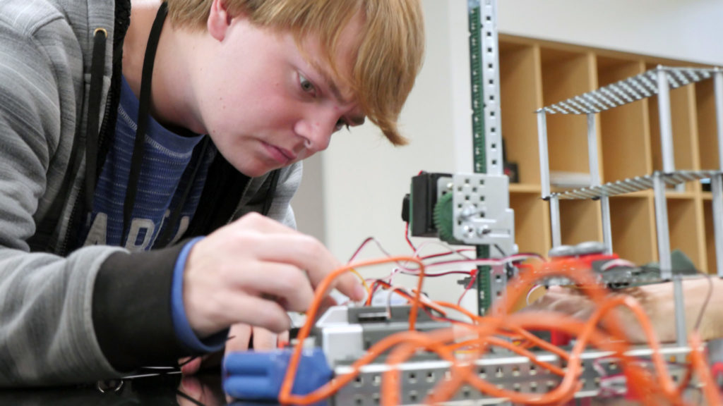 Photo of a student working on an engineering project