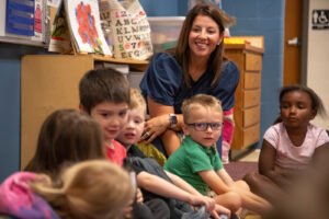 A teacher and her elementary school students learn about one another on the first day of school.